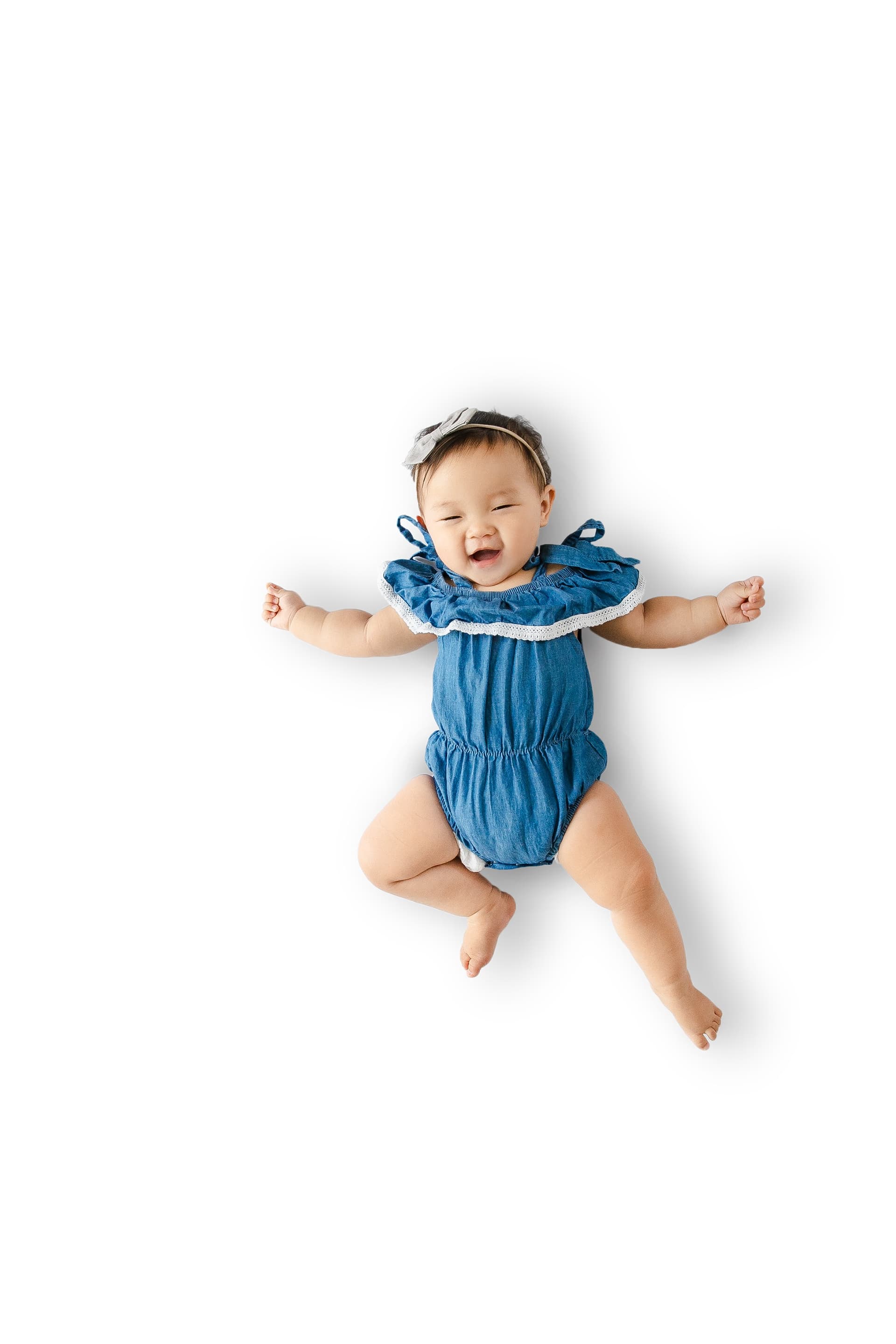 Toddler crawling on Everline foam mat in living room