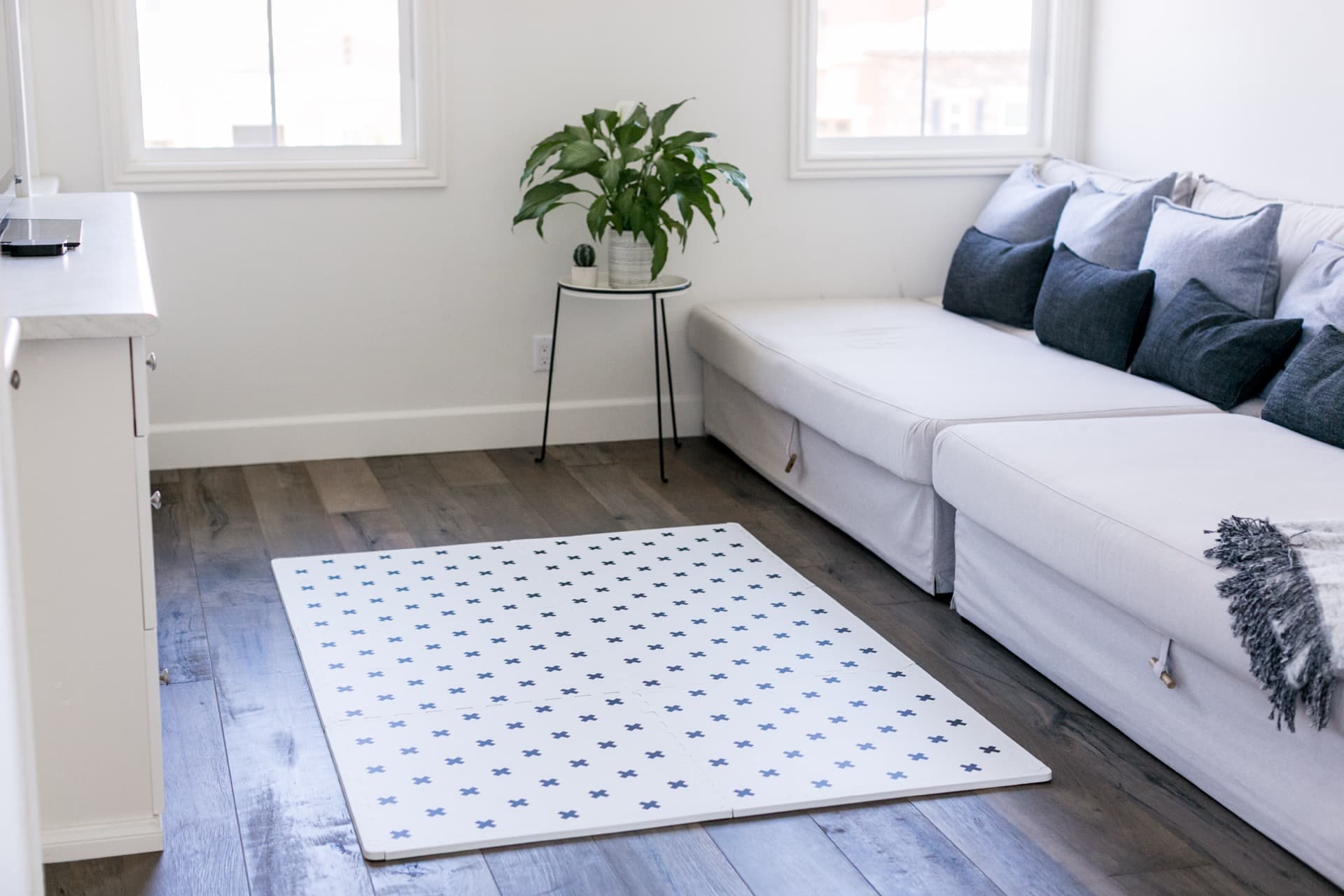 An Everline play mat in a styled modern nursery