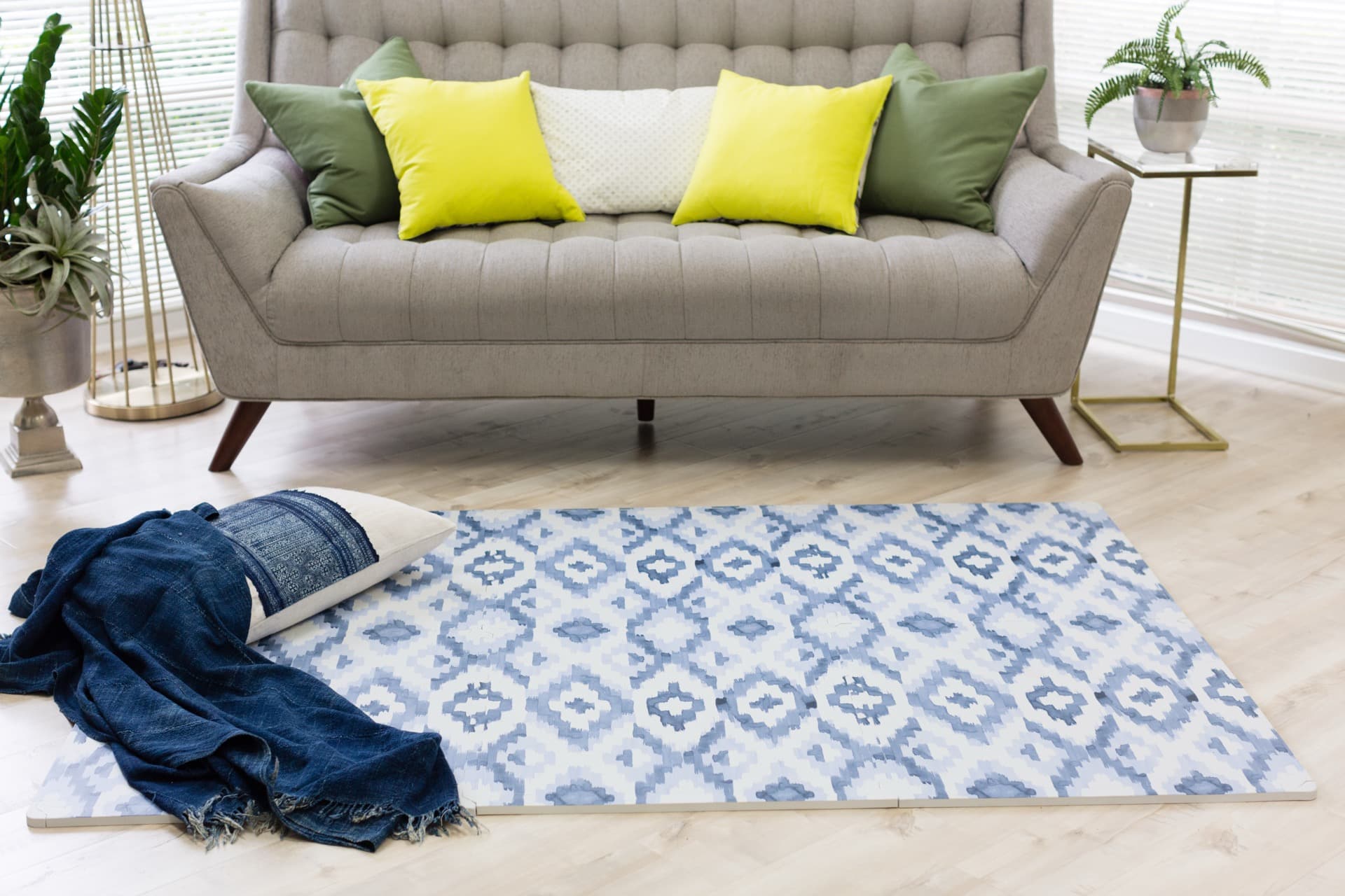 Parent and baby playing together on Everline mat